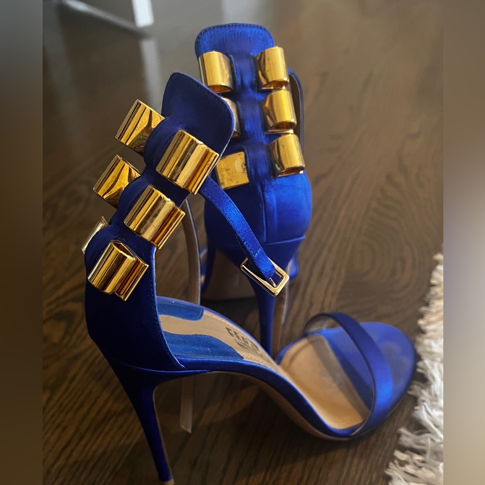 Blue Satin Ferregamo heels with gold buckle